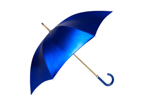 The shimmering lights of the steamy Thai capital was the inspiration for the Bangkok. Our use of heat transfer foils makes for a real statement umbrella, finished with a matching lacquered Maple handle.