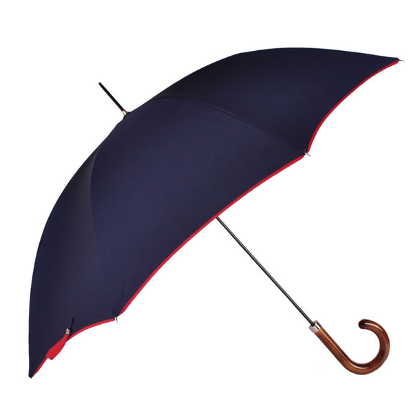 Poly Cotton canopy with contrast binding. Black metal tube frame. Nickel finishes. Scorched Maple handle. Available in Ivory/Yellow, Navy/Red, Black/Blue.